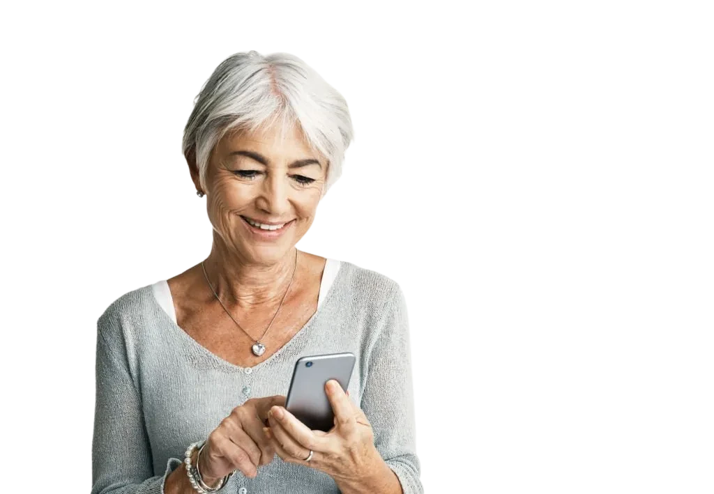 Woman smiling while checking grant updates on her phone